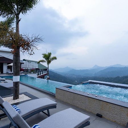 The Panoramic Getaway Hotel Munnar Bagian luar foto The swimming pool at the resort