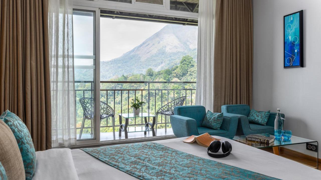 The Panoramic Getaway Hotel Munnar Bagian luar foto View of Mount Apo from the hotel
