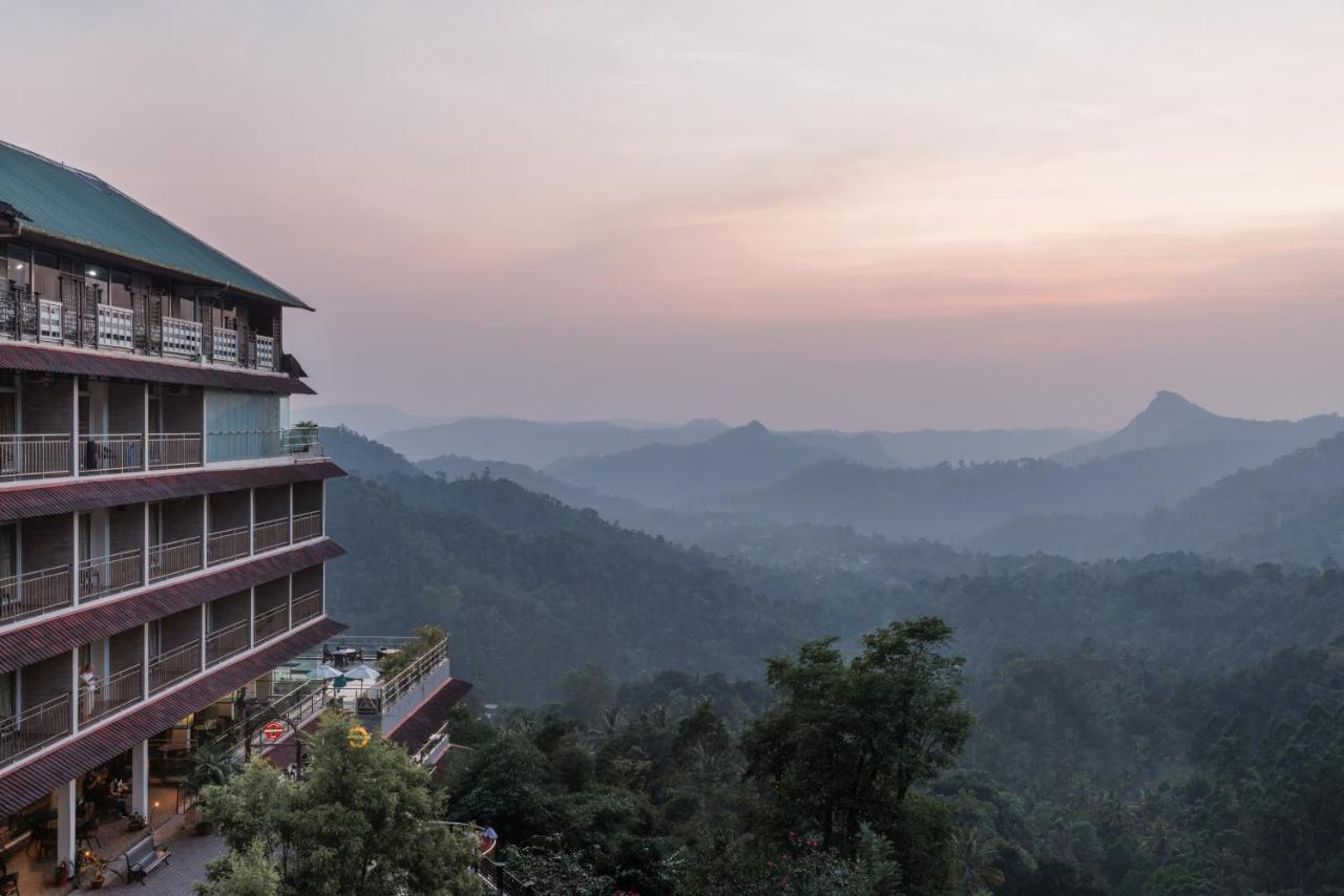 The Panoramic Getaway Hotel Munnar Bagian luar foto View of the hotel