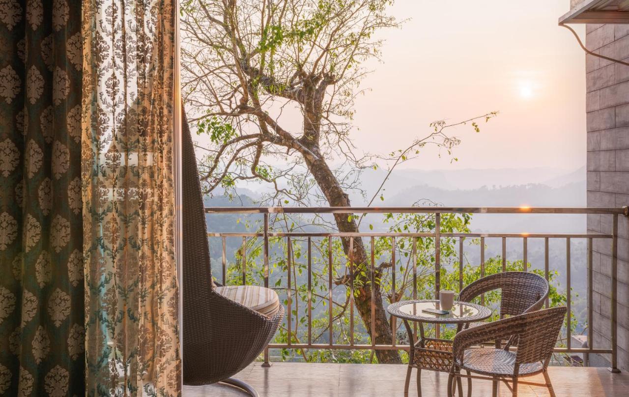 The Panoramic Getaway Hotel Munnar Bagian luar foto View from the balcony of a suite at the resort