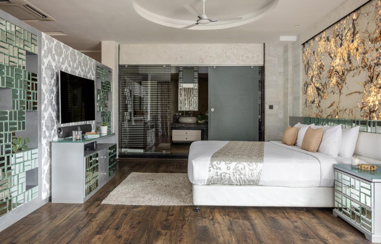 The Panoramic Getaway Hotel Munnar Bagian luar foto A bedroom at the hotel