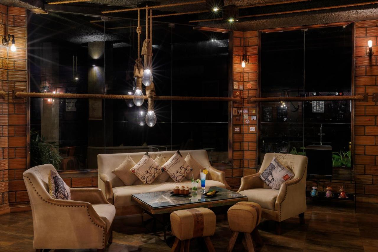 The Panoramic Getaway Hotel Munnar Bagian luar foto The lounge at the hotel