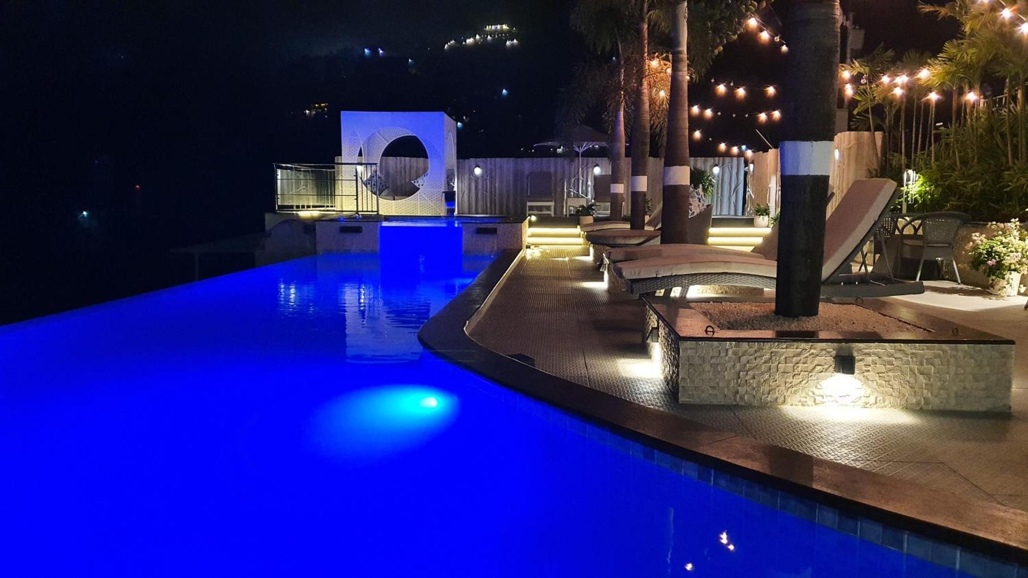 The Panoramic Getaway Hotel Munnar Bagian luar foto The pool at the hotel