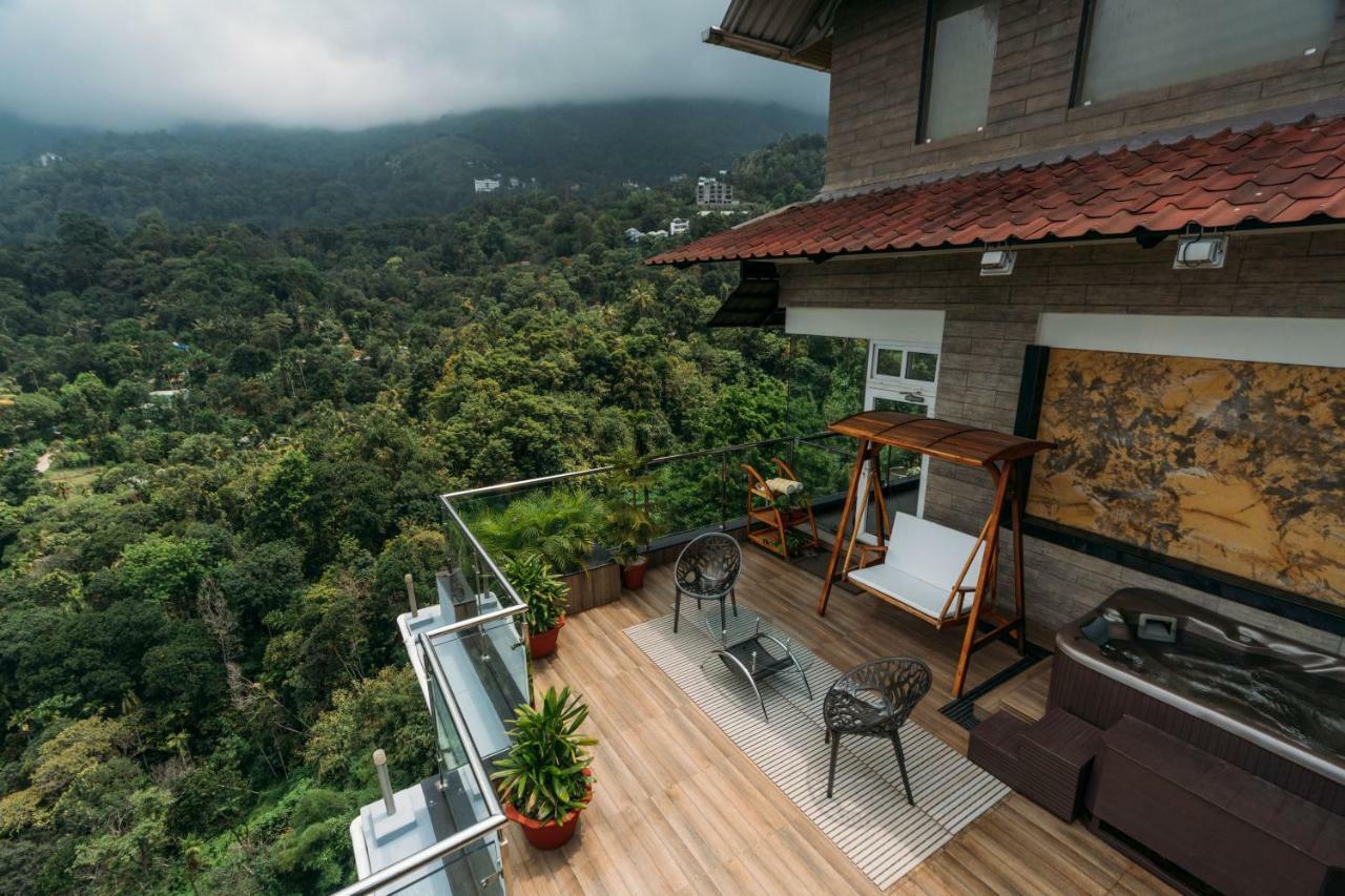 The Panoramic Getaway Hotel Munnar Bagian luar foto A view from the balcony of a house in Kerala, India